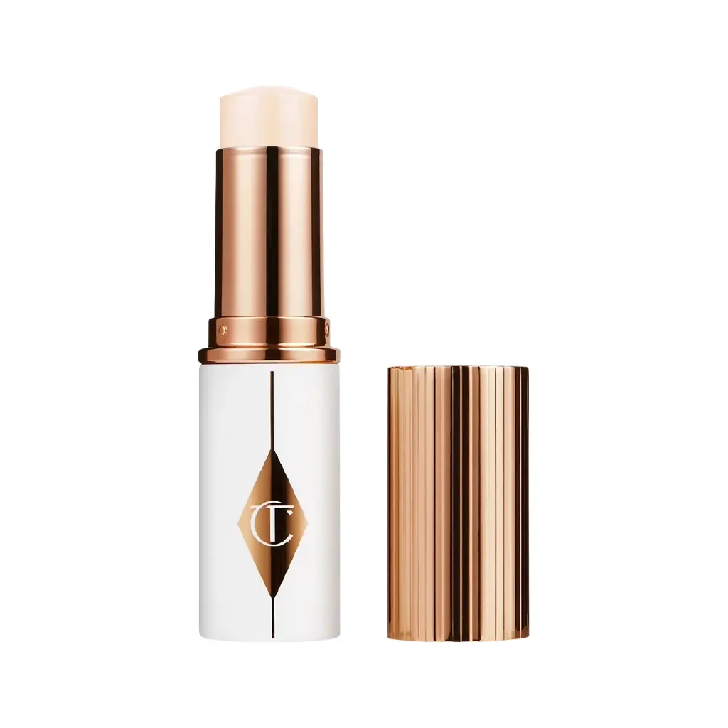 CHARLOTTE TILBURY - UNREAL SKIN SHEER GLOW TINT HYDRATING FOUNDATION STICK 9G